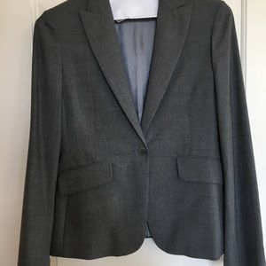Grey wool-mix suit jacket and cropped trousers for one price.
